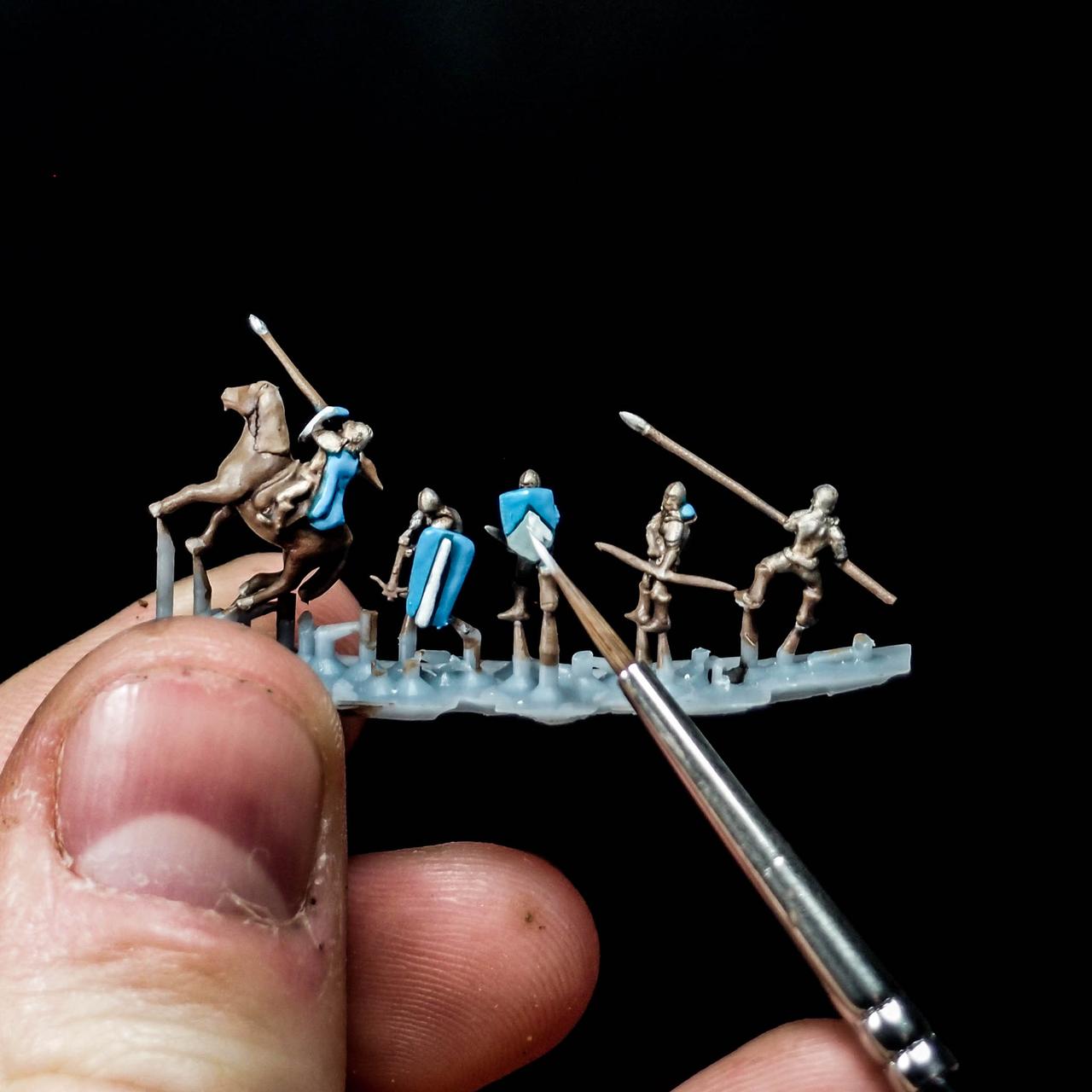 Painted small-scale medieval miniature soldiers