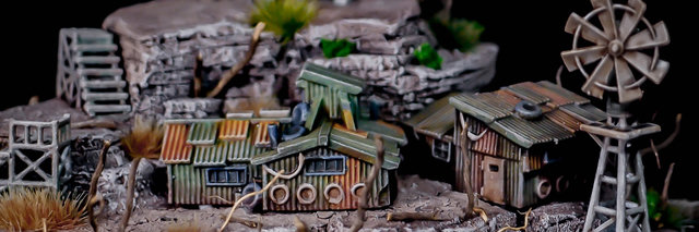 A rocky miniature settlement with a lookout tower